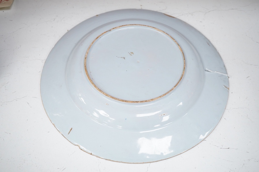 An 18th century English delftware plate, 34cm